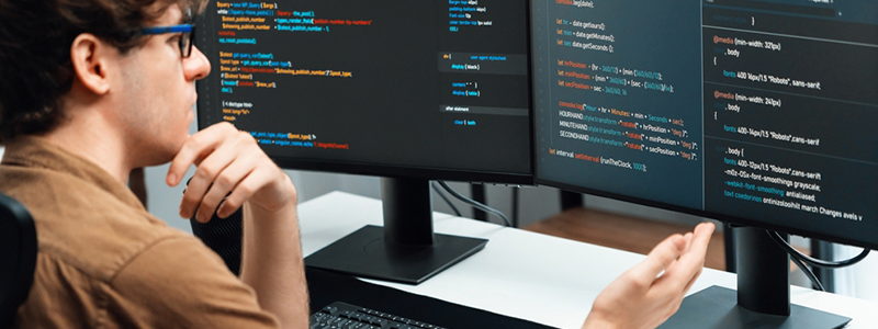 Man on computer software engineering
