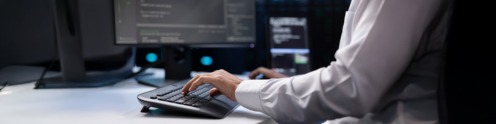 Man typing on computer computer science